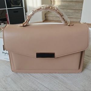 Miztique blush pink hand purse
